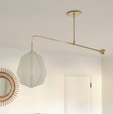 We don't advise you to put your health or even possibly your life on the line. A Simple Fix For An Off Center Lighting Fixture Blog Design Confetti