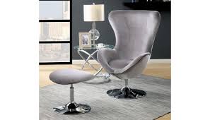 Wrapped in a plush fabric that complements the accents and matte toned legs, the item makes not only for a visually enticing seating option but also for a stable and sturdy one in any contemporary space. Midori Grey Fabric Modern Accent Chair