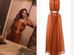 John legend and chrissy teigen, along with their friends, spent their afternoon trying to save a little rodent from drowning in. Celebrity Fashion Instagram Chrissy Teigen S Orange Rust Cutout Dress Shop Your Tv