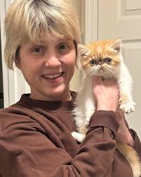 What a ham! Mon Chéri Lucille, a black Exotic Shorthair cat is with Dylan  P. of Cohasett, Massachusetts. See our customer album at  https://monchericattery.com/about/customer-photos/