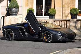 Matte Black Monster Lamborghini Aventador Lp700 4 With The Door Open Spotted Outside The Berke Lamborghini Aventador Lamborghini Aventador Lp700 4 Lamborghini