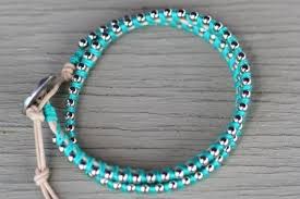 Maybe you would like to learn more about one of these? Bracciale Con Filo Di Cotone E Catena Bigiotteria