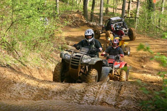 Four-wheeler ATV on a dirt trail, AI generated