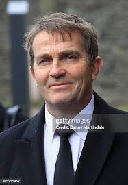 Norman Wisdom's daughter Jackie Wisdom is comforted by a friend at... News  Photo