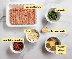 Smear the feta cheese spread on the inside of the buns, add the burger, and layer on the toppings. Sun Dried Tomato Spinach And Feta Turkey Burgers Lemons Zest