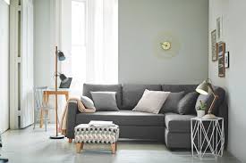 {tufted ottoman} {mixed wood side table}. 7 Clever Ways To Transform Your Living Room Without The Hefty Price Tag