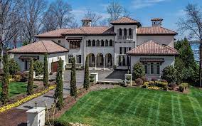 One Of A Kind Mediterranean Style Villa With Spectacular Lake Norman Views Stucco Exterior With Barr Expensive Houses Beautiful Home Gardens Resort Style Pool