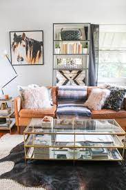 For a modern living room, a secretary, a showcase for an exhibition of luxury dishes, souvenirs or various collections will be an excellent choice. Tour A Western Modern Glam Living Room Horses Heels
