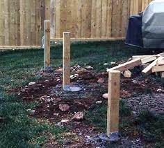 support posts installed on top of sonotubes for a new deck inatallation deck footings deck posts concrete deck