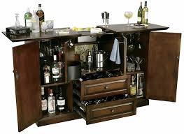 695082 howard miller wine storage cabinet. Howard Miller 695 080 Bar Devino Hide A Bar Wine Spirits Console Beveragefactory Com