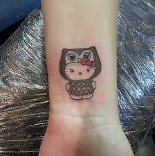Outline kitty tattoo on side leg. 80 Hello Kitty Tattoo Ideas Hello Kitty Tattoos Hello Kitty Kitty