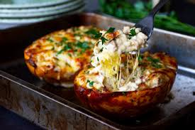 Keto Cheesy Chicken Spaghetti Squash Diet Doctor Cheesy Chicken Spaghetti Chicken Spaghetti Squash Squash Recipes