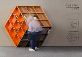 A Wooden Bookcase Inspired By The Rubik S Cube Design Milk Bookcase Design Wooden Bookcase Cube Design