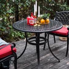 A patio table umbrella made to go through the hole of an outdoor dining table needs a secure umbrella stand, even if it's being steadied by the patio dining table itself. Nuu Garden 36 Inch Outdoor Round Patio Aluminum Bistro Table With Umbrella Hole In Antique Bronze Ct002a The Home Depot
