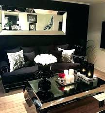 This artistic black and white living room utilizes a solid block design. Living Room Decor Ideas Black And Silver Home Decoration Design Ideas