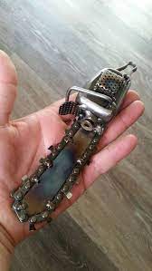 This Chainsaw Sculpture Is Made From Reclaimed Steel And Nuts And Bolts Then Clear Coated To Protect Finish F Metal Yard Art Scrap Metal Art Chainsaw Sculpture