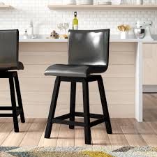 The stool is made from solid wood from top to within the space of 30 minutes, you could easily begin and complete the assembling of the stool. Hokku Designs Lawrence Swivel 24 75 Counter Stool Reviews Wayfair