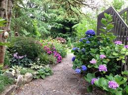 An Eclectic Garden Delights With Unexpected Surprises Garden Design Calimesa Ca Northwest Garden Garden Design Dream Garden