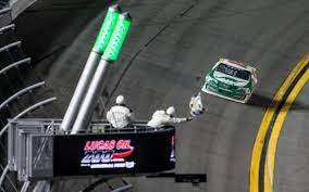 The officer next to her, his face really says it all. Michael Self Survives Overtime Crashes To Win Arca Daytona