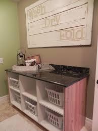 Folding Counter With Laundry Basket Storage Paint It And Do Wood Top Instead Laundry Room Art Laundry Folding Tables Laundry Room Organization