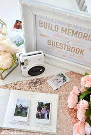 The wedding bundle comes with 60 shots of wide film to get you started and a fantastic wedding guest book and pen. Instax Photo Guestbook For Your Wedding Or Shower Kara S Party Ideas Bridal Shower Guest Book Bridal Shower Guest Wedding Guest Book