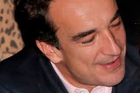 Sarkozy assembles veteran crew for financial-services investing