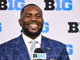 With new coach, No. 9 Michigan begins title defense vs. Fresno St.