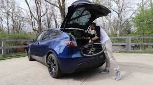 The model y's trunk is huge and has two underbins. Tesla Model Y Review What Does A Reviewer Of Regular Cars Think