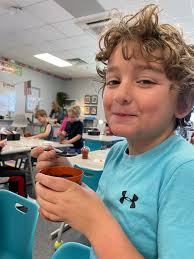 Molly Sullivan, Miss Campbellsville, read "The Soil In Jackie's Garden" to  our 1st grade classrooms. Her mother, Carol, prepared dirt pudding with a  worm for our students. Each class is going to