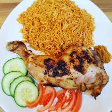 Add the chicken back to the pot and pour in the rest of the broth and tomato puree. Jollof Rice With Suya Spiced Grilled Chicken Recipe
