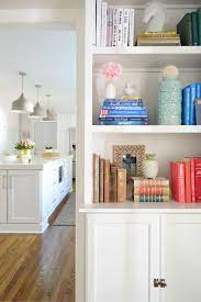 However, when you use wall cabinets for base cabinets, it's not that straight forward, so i'm sharing some tips and tricks that i learned along the way. Adding Built In Bookshelves Around Our Living Room Doorway Young House Love