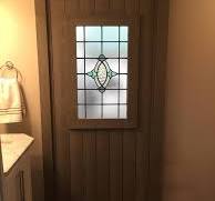 Construí una puerta de granero personalizada con una ventana ...