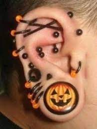 weird piercings and weird places for them on pinterest in 2021 tragus piercings crazy piercings piercing