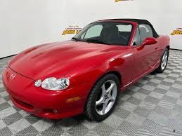 Image result for Medium Red Mica 2004 Pontiac