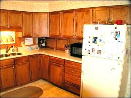 Average cost to replace the doors and drawers on a kitchen with 20 doors and 5 drawer fronts. Refacing Kitchen Cabinets Cost Refinish Average House N Decor