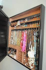 Depending on how the jewelry box will have to be divided, test the sponge pieces by organizing them neatly inside the box. A Jewelry Box Hidden Behind A Photo Frame On Hinges Dollar Store Organizing Jewellery Storage Home Diy