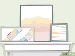Adhesive hooks or nails have adhesive backings that stick to walls, so that you can mount pictures using the hanging hardware attached to the picture. 3 Ways To Hang Stuff On Walls Without Leaving Marks Wikihow