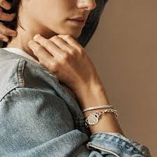 A bracelet is an article of jewellery that is worn around the wrist. Sterling Silver Heart Tag Charm Bracelet Tiffany Co
