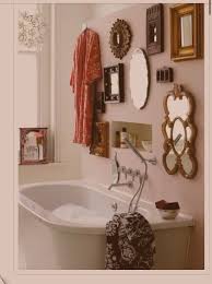 Bathroom wall decor doesn't have to be a piece of art or colorful wallpaper. Cafe Style Mirrors Hung Above Bath Bathroom Feature Wall Bathroom Wall Decor Home