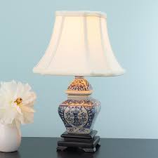 If neutral lamp shades in classic white, cream, or beige aren't your style, consider adding a pop of color, like a bright blue, navy, green searching for replacement lamp shades online to update an older floor or table lamp can be fun! Blue And White Traditional Mini Table Lamp Shades Of Light
