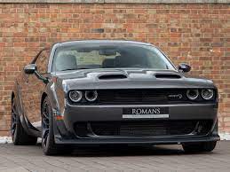 The dodge challenger lives on with its classic bold design and showing off is all part of the fun, and the challenger srt® hellcat bears the mighty hellcat emblem. 2020 Used Dodge Challenger Srt Hellcat Granite Crystal Metallic