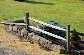Rustic garden fence design idea. Rocks And Hard Places Fence Landscaping Stone Landscaping Driveway Fence