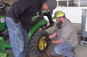 tractor time with tim fills his tires with beet juice rim