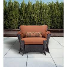 To style your own outdoor patio with adirondack chairs, choose the finish that best suits your space.look for chairs in a distressed, unfinished style to create a more rustic atmosphere, or choose modern black patio seating for a contemporary look. Hanover Strathmere Allure 2 Piece Patio Set With Oversized Armchair And Ottoman With Woodland Rust Cushions Strathallure2pc The Home Depot Wicker Patio Chairs Outdoor Chairs Deep Seating Chair