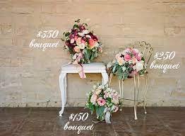The cost of real ones for a wedding is outrageous, and i didn't want to have to leave anyone out of another benefit of artificial bouquets is that when the wedding is over, you don't have to preserve it. Snippets Whispers Ribbons Wedding Flowers Cost Wedding Bouquet Cost Wedding Bouquets Budget