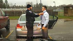 Dashcam: Police Officer Helps Speeding Student Tie His Tie - YouTube