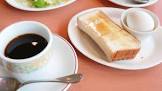 PS「タワマンでモーニングトーストとコーヒー」ニシ「団地で納豆卵ご飯、お茶」