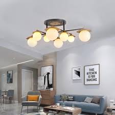 There are so many ways to add ceiling lights to your home that you're sure to find a great fit for the look you want. Mid Century Modern Globe Ceiling Light Frosted Glass 4 6 8 Light Semi Flush Light In Brass Takeluckhome Com