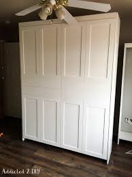 A comfortable twin or queen sized bed, tucked away in an elegant space saving chest! Diy Modern Farmhouse Murphy Bed How To Build The Bed And Bookcase Addicted 2 Diy