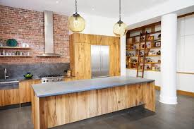 Eugene Pendants Over The Kitchen Island Made Of Reclaimed Wood In The Nyc Loft By Lauren Rubin Arch Brick Wall Kitchen Contemporary Open Kitchens Brick Kitchen